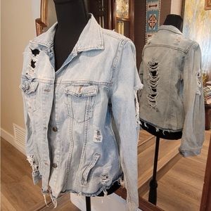 One of a kind! coolest jean jacket ever! Will sell fast!